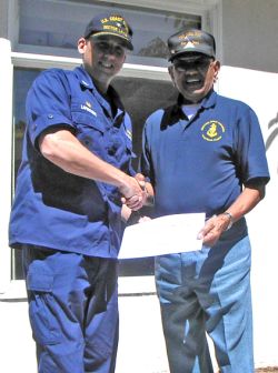 CAPT Laferriere presenting certificate to Gunny