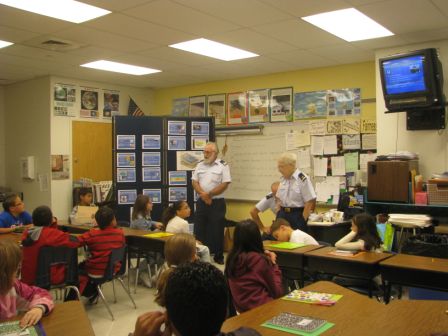 Auxiliary instructors fielding questions from the students