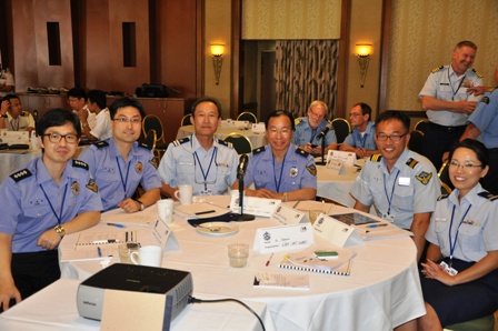 Auxiliary Korean interpreters, Seyoung Kim (3rd left) and Jihwan Baek (1st right) were working with the Korean Coast Guard delegation on the Seminar Day.