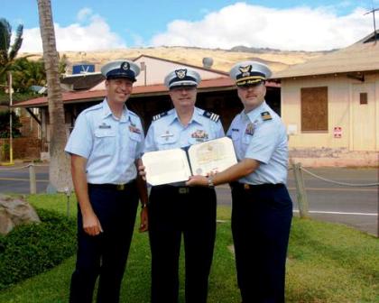 USCG recognizes Auxiliarist Lawrence Ankrum for years of volunteer service in District 14.